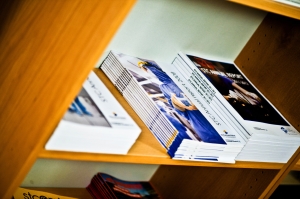 Research journals on a shelf